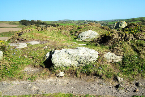 Another of the Boscregan cairns - this clifftop cairn, visible from out to sea, had a cist inside it. Chapel Carn Brea is behind.