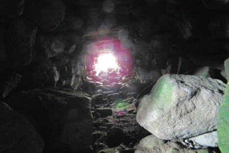 Inside the fogou at Pendeen Vau - looking up toward the entrance. The tunnel slopes down quite a lot.