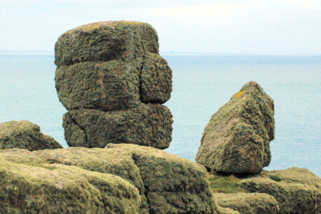 Watcher, near Pordenack Point, Cornwall. In the distance are the Isles of Scilly.