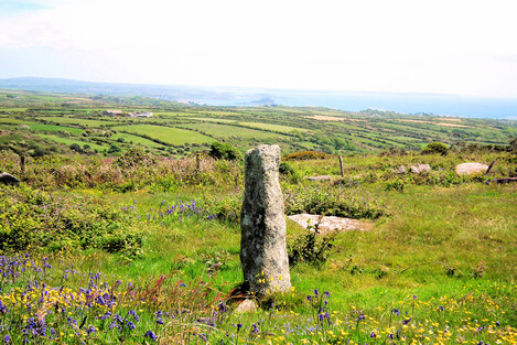 Not all menhirs are menhirs. Despite its excellent view of St Michael's Mount, this stone at Bosiliack is a cattle rubbing stone. Usually these are cow-height, while menhirs are either higher or lower than this.