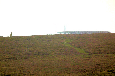 Cosmic energy of two kinds. Boswens menhir is on the side of Dry Carn, on top of which is a major air traffic control beacon for communicating with aircraft. Where truly lies the power?