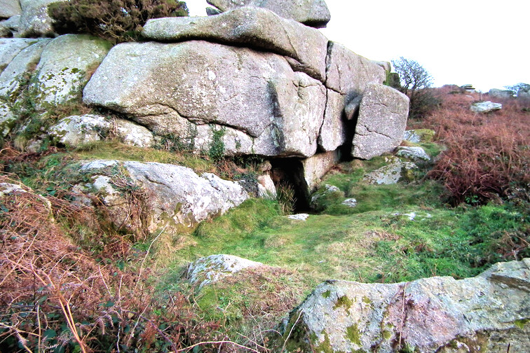The well just below the summit of Trencrom Hill, a multi-period neolithic tor enclosure and iron age hill camp.